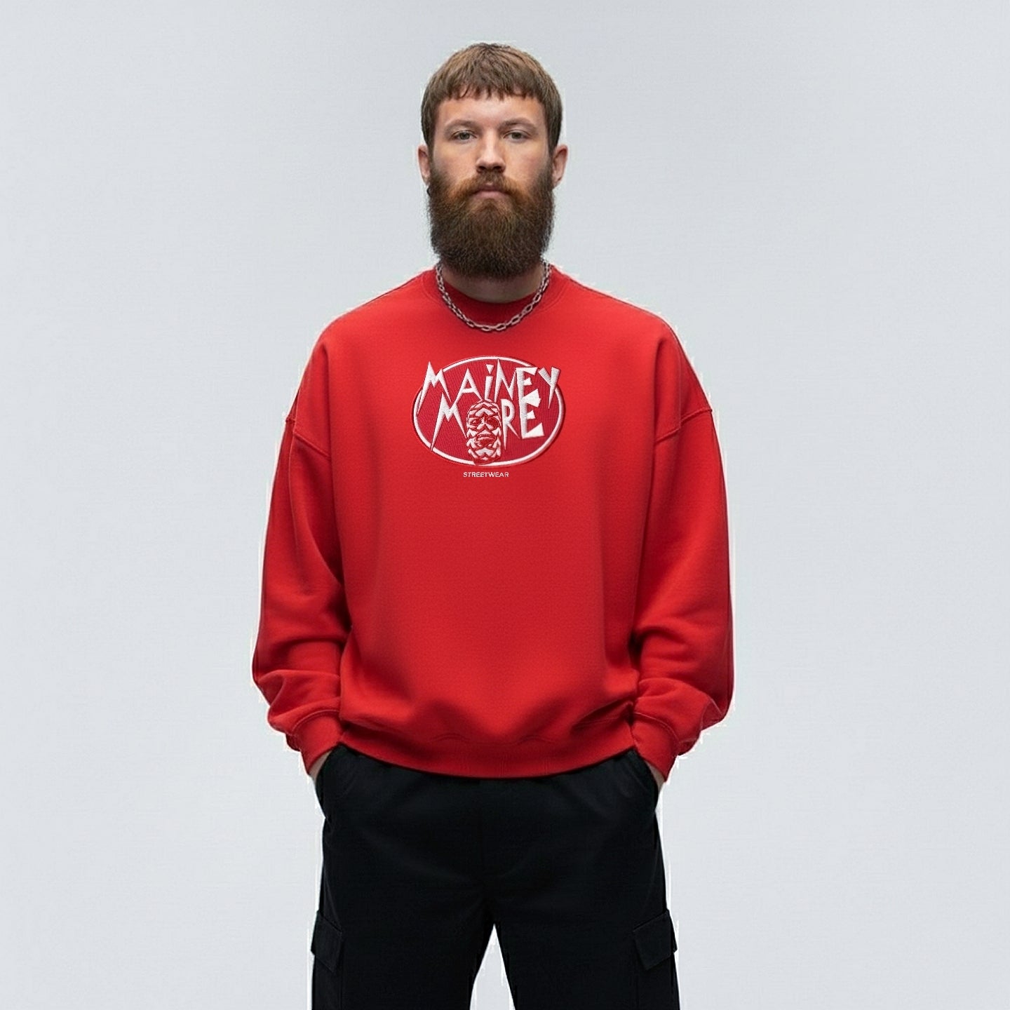 Red sweatshirt from Mainey More with an abstract mask and eye-catching comic lettering, luxurious and stylish.