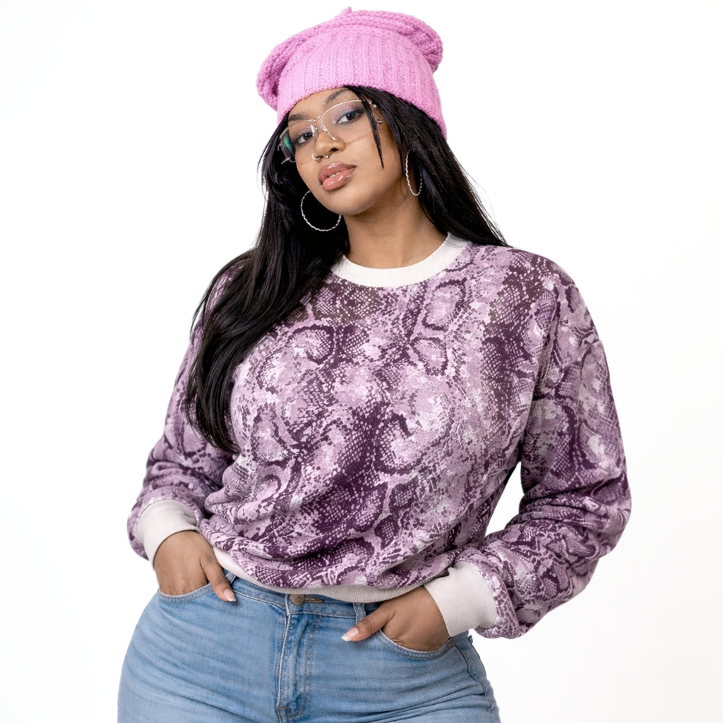 Ophidian knit sweater with ribbed collar, cuffs and hem