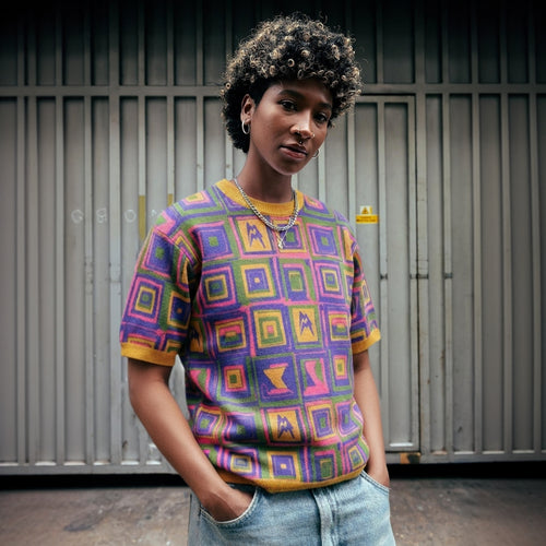 Vibrant retro-inspired op-art t-shirt with multicolor squares and saffron rib collar