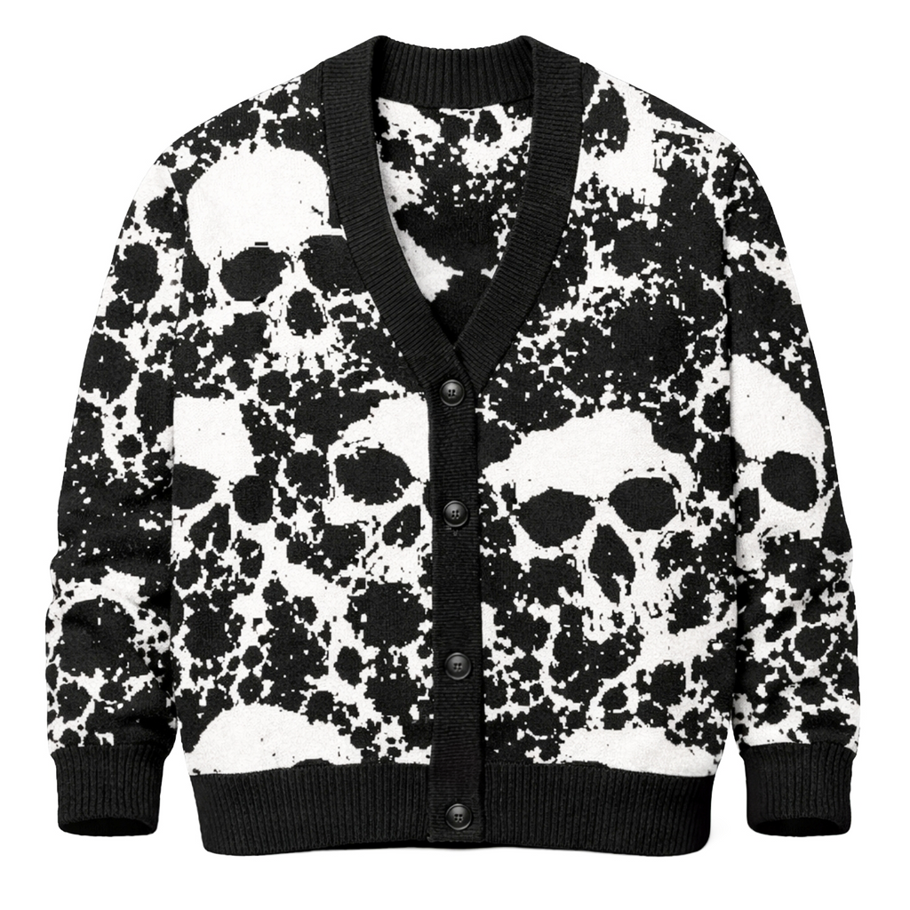 Relaxed fit woven cardigan in black and white, skulls emerging from an ink splatter pattern, black button placket